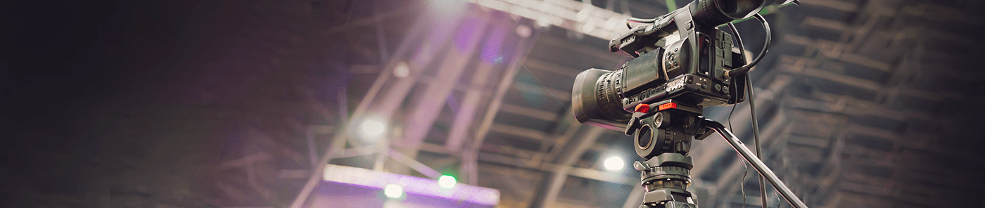 Television camera in a lit studio
